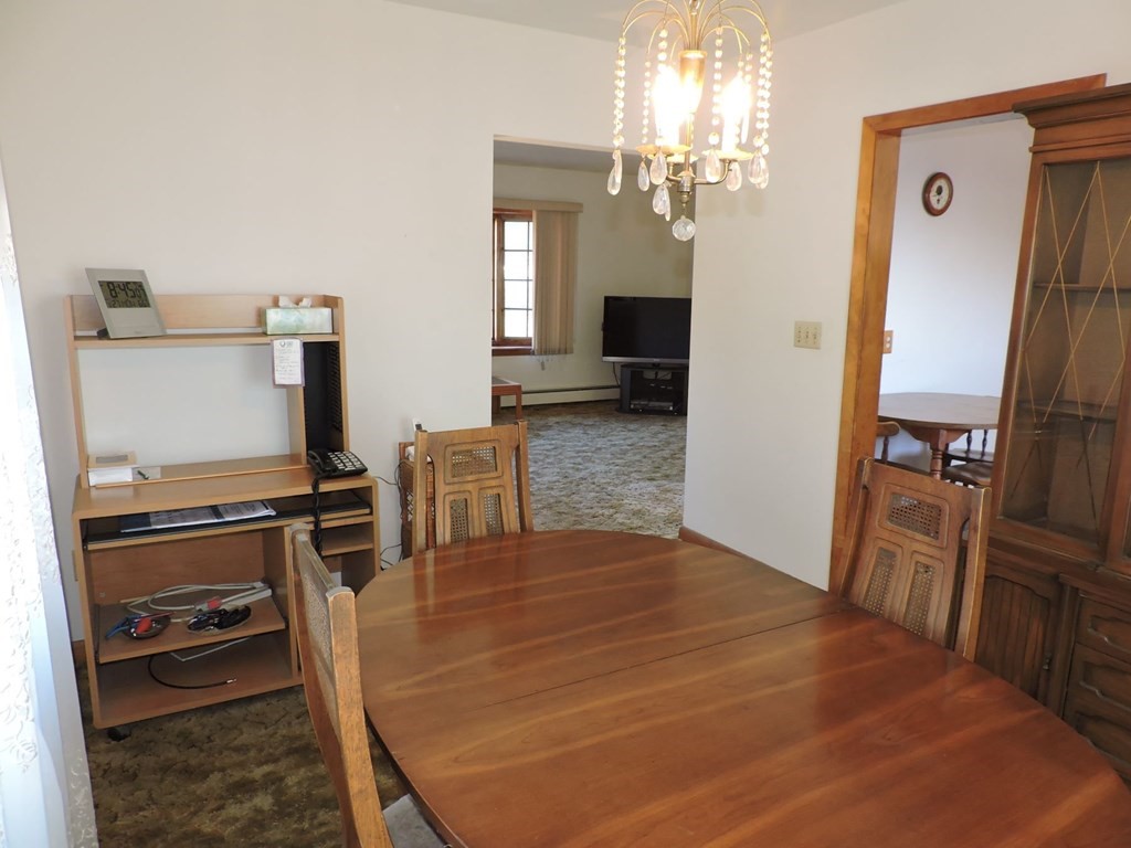 110 Gore Road Webster, MA 01570 - Photo 15 of 42 a kitchen with granite countertop a refrigerator stove and sink