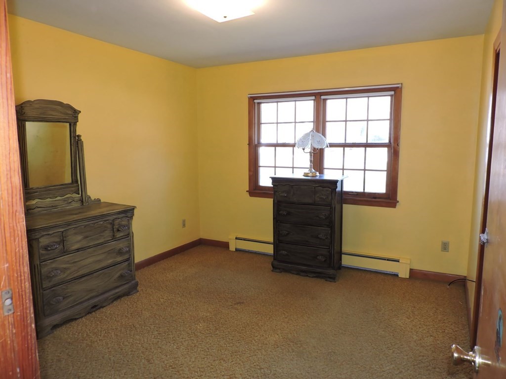 110 Gore Road Webster, MA 01570 - Photo 22 of 42 wooden floor and window in an empty room