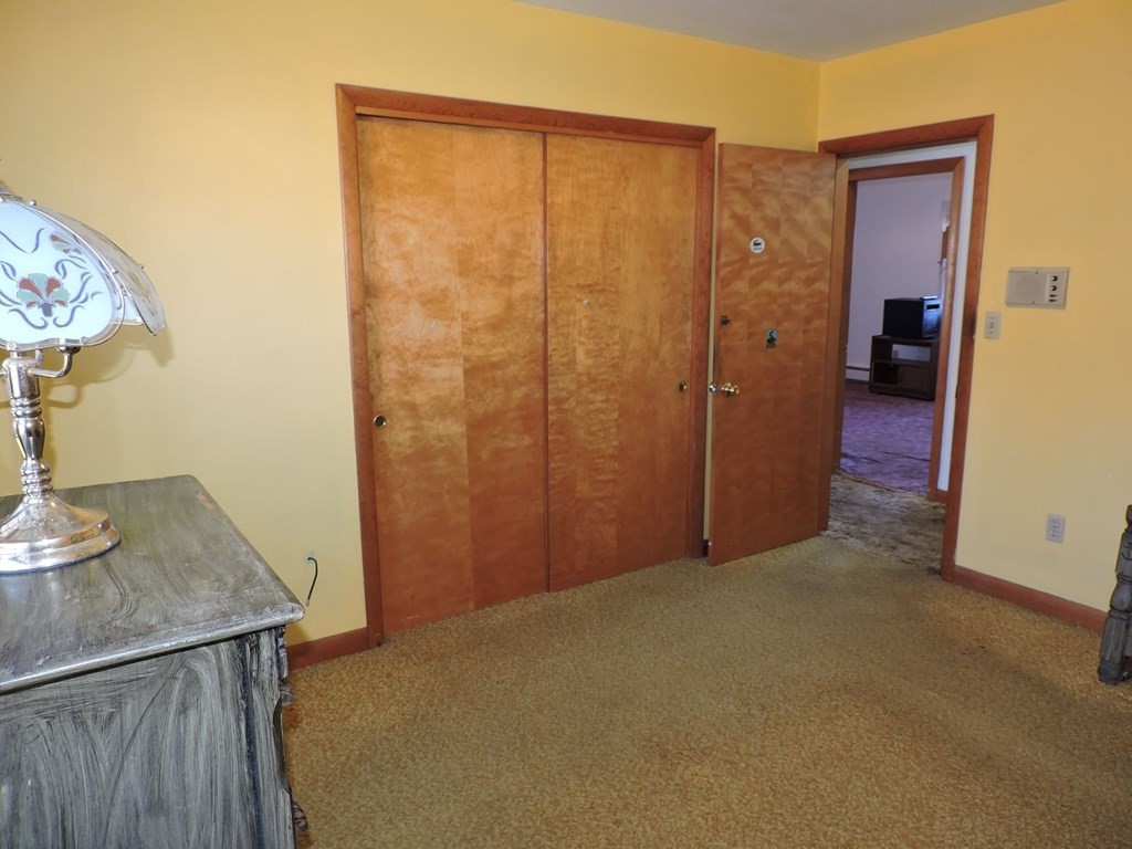 110 Gore Road Webster, MA 01570 - Photo 23 of 42 an empty room with a door