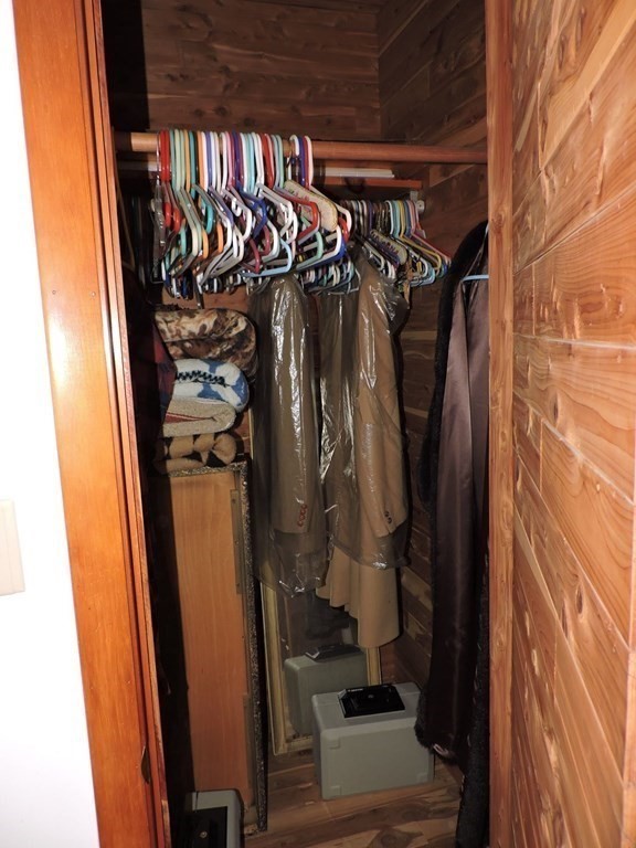 110 Gore Road Webster, MA 01570 - Photo 26 of 42 a view of walk in closet with clothes and shoes