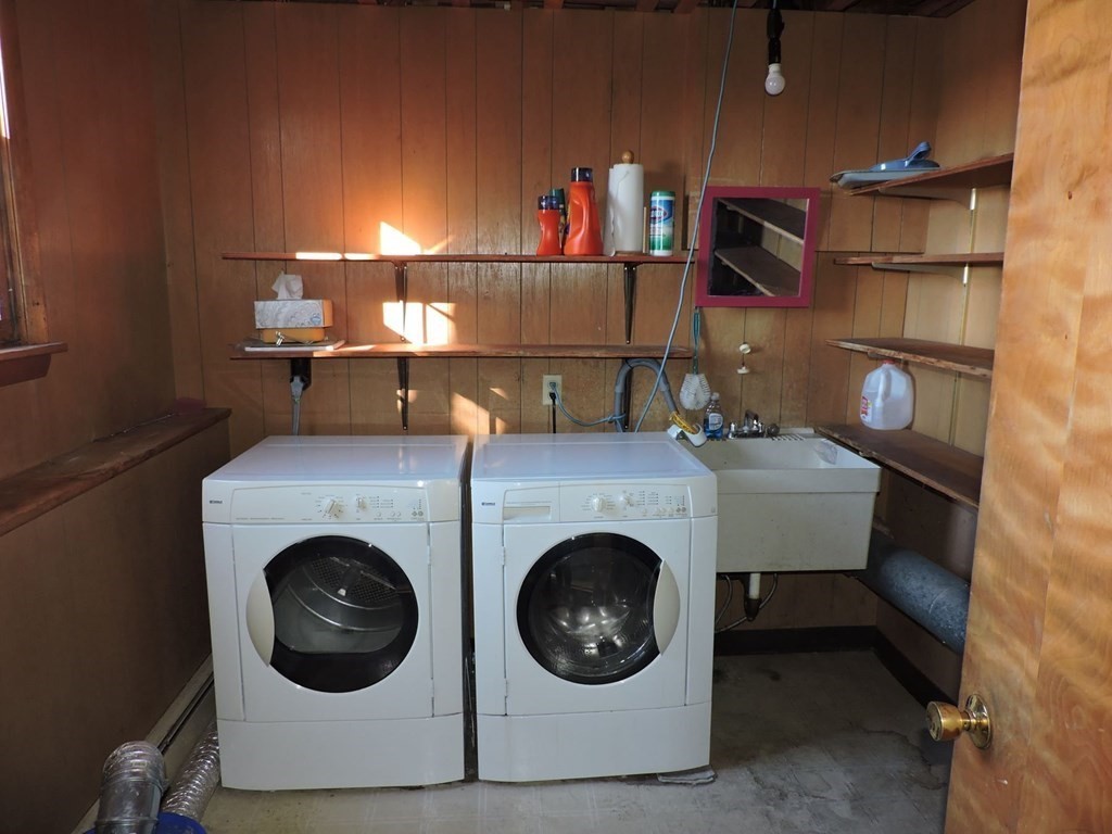 110 Gore Road Webster, MA 01570 - Photo 39 of 42 a utility room with dryer and washer