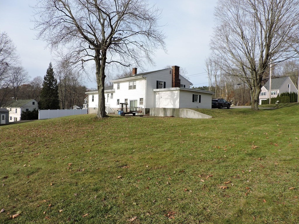 110 Gore Road Webster, MA 01570 - Photo 7 of 42 a view of a house with a yard