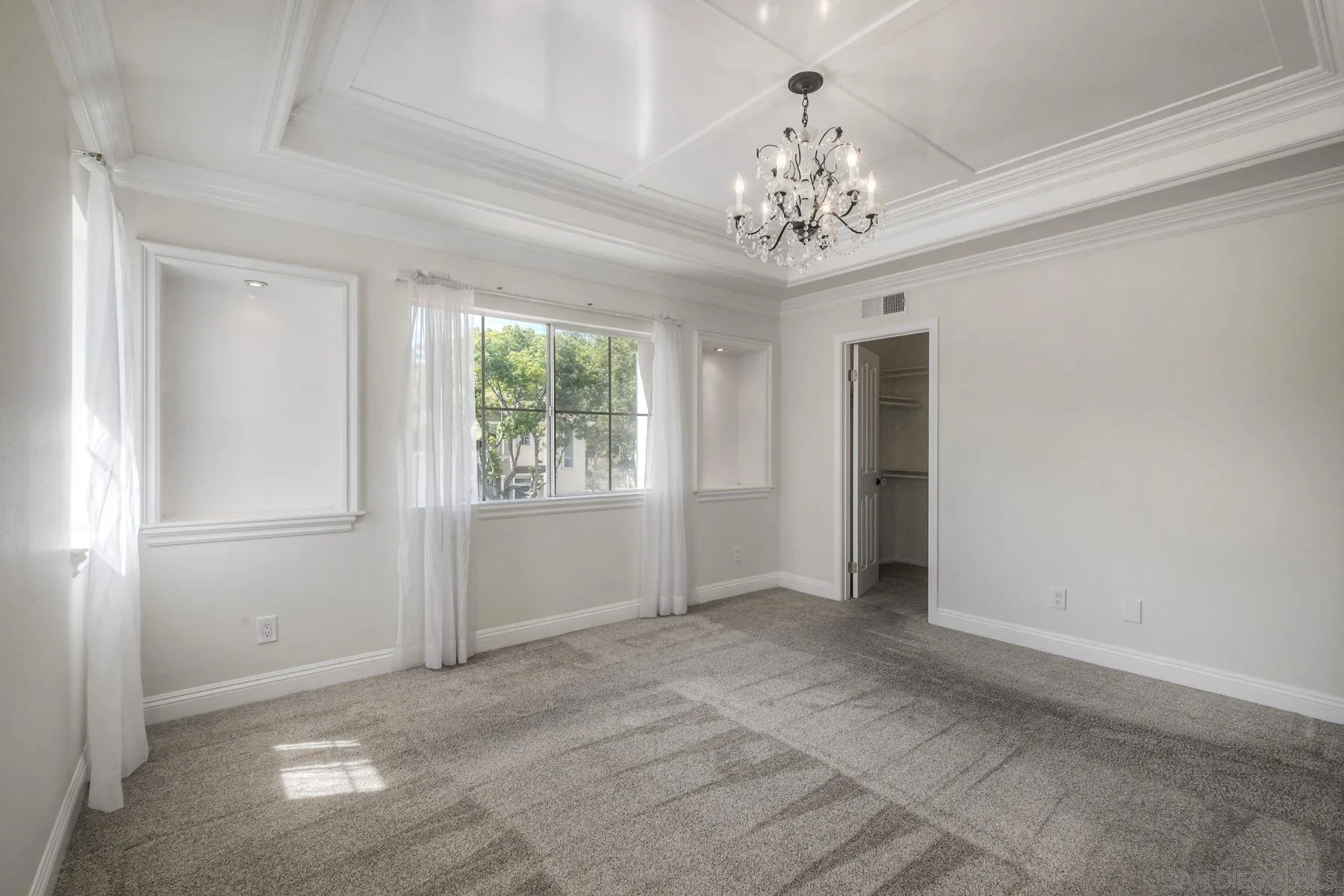 9633 Stonecrest Boulevard San Diego, CA 92123 - Photo 26 of 45 wooden floor in an empty room with a window