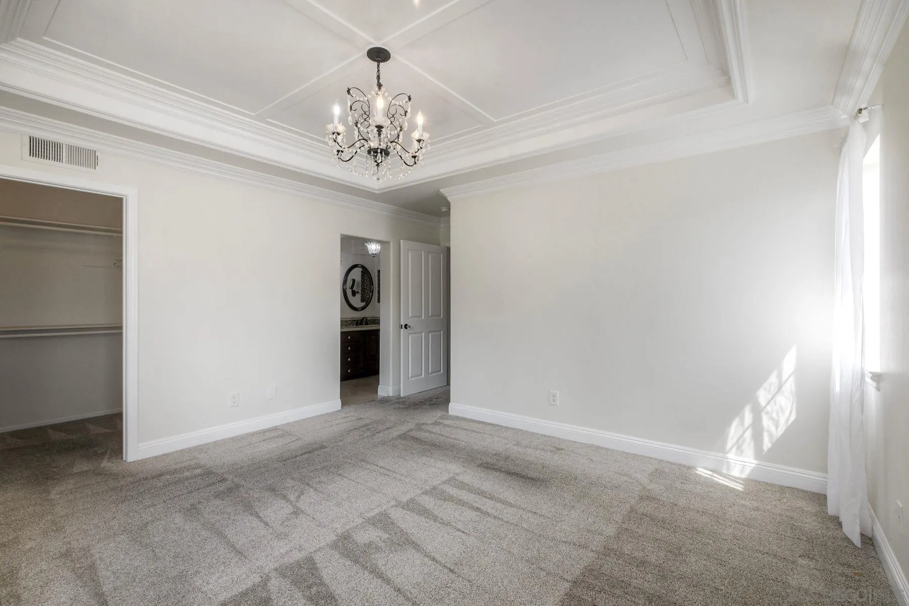 9633 Stonecrest Boulevard San Diego, CA 92123 - Photo 27 of 45 a view of an empty room with a window