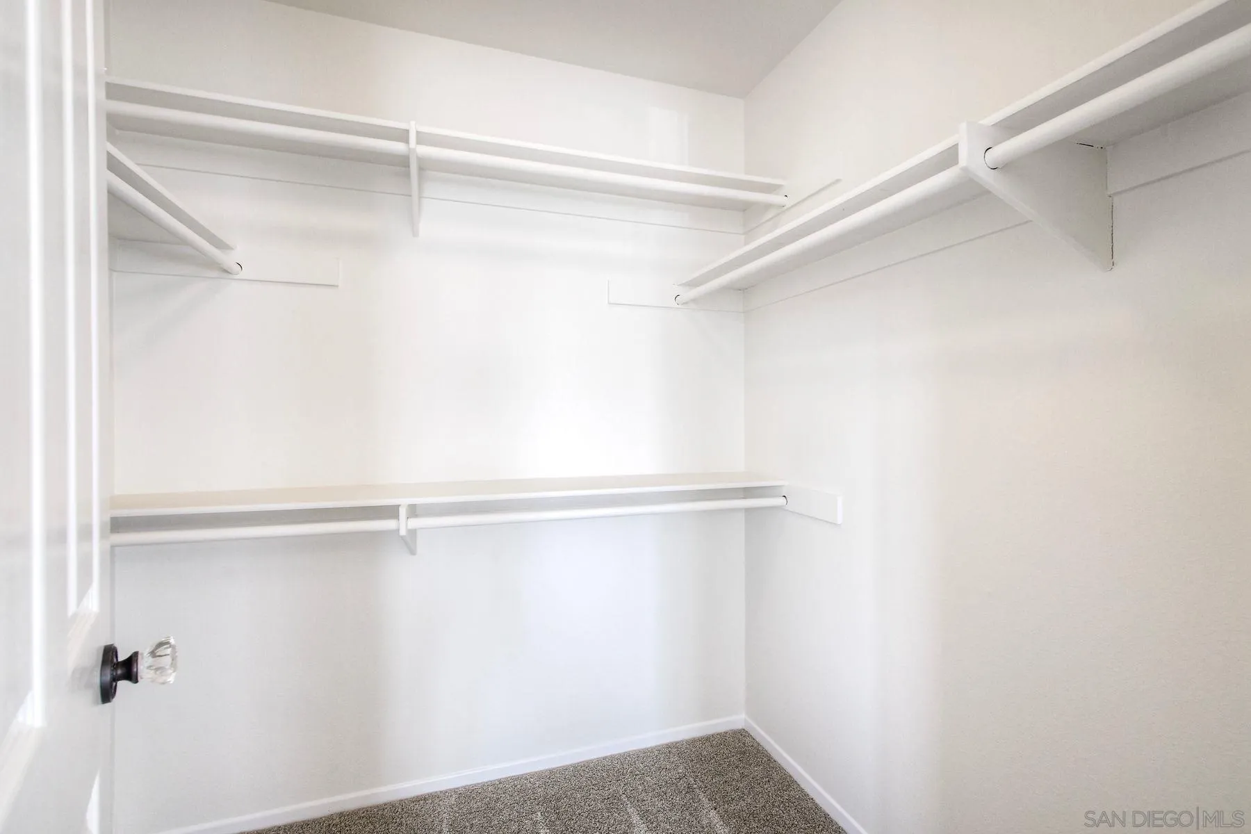 9633 Stonecrest Boulevard San Diego, CA 92123 - Photo 29 of 45 a view of an empty walk in closet