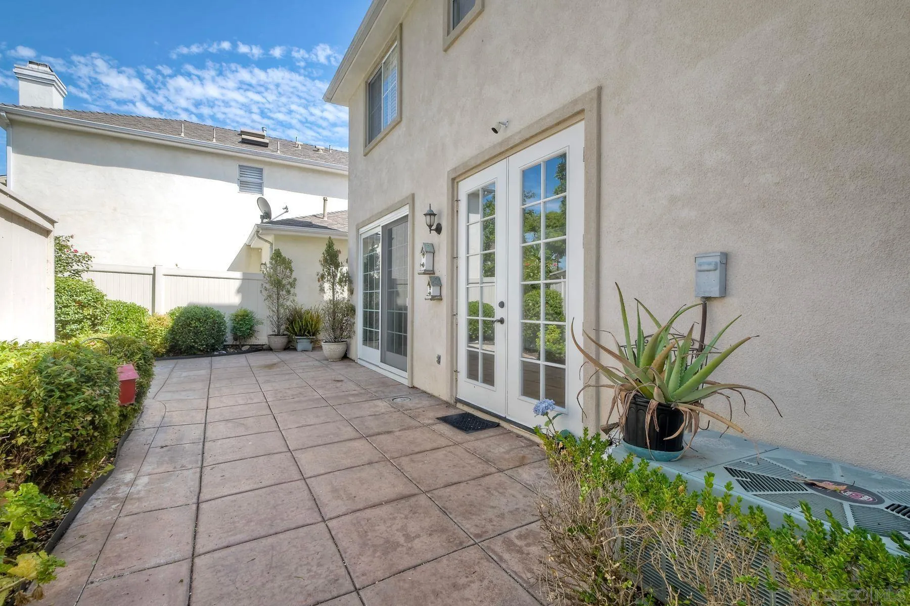 9633 Stonecrest Boulevard San Diego, CA 92123 - Photo 32 of 45 a view of a entryway door of the house