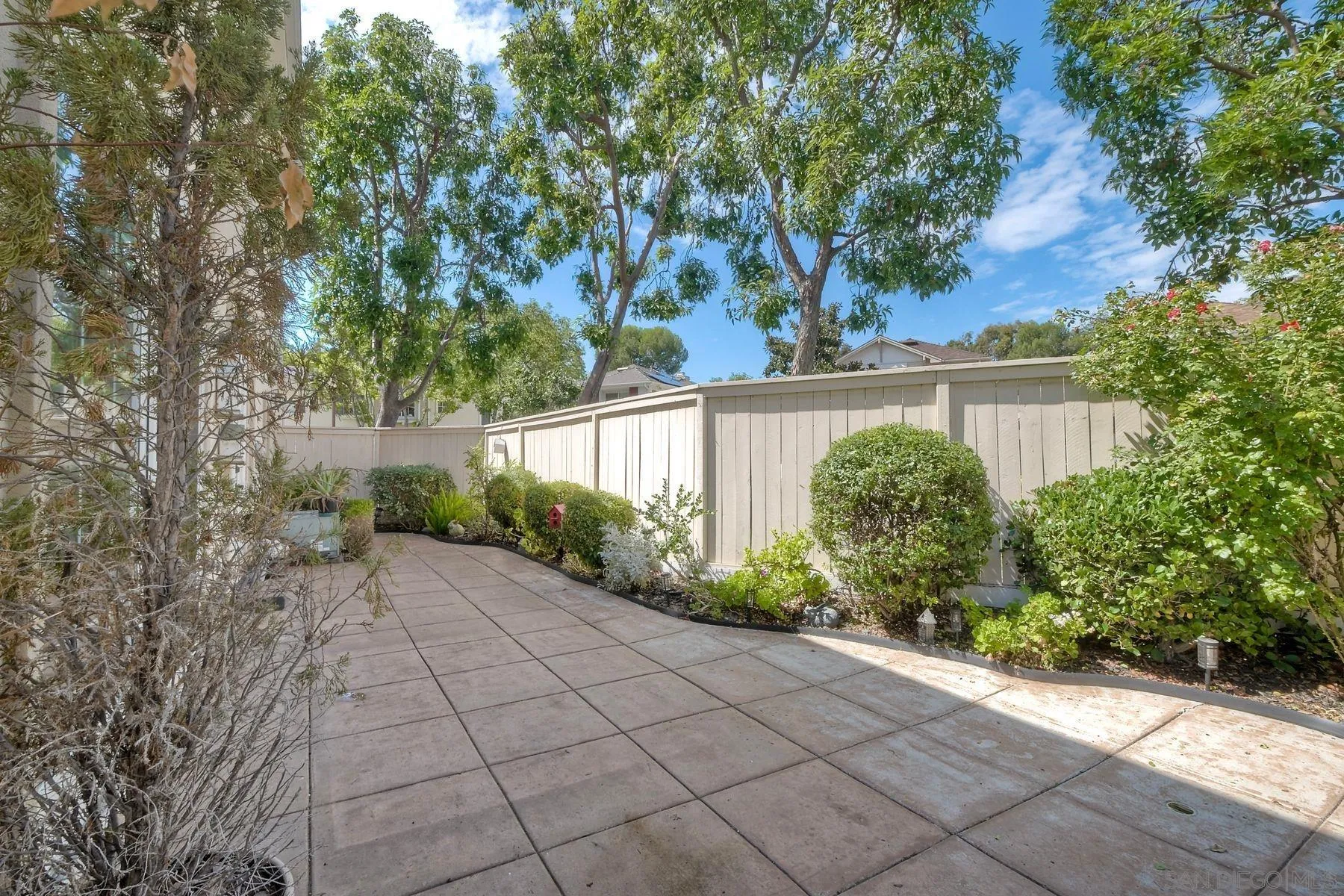 9633 Stonecrest Boulevard San Diego, CA 92123 - Photo 34 of 45 a view of a backyard