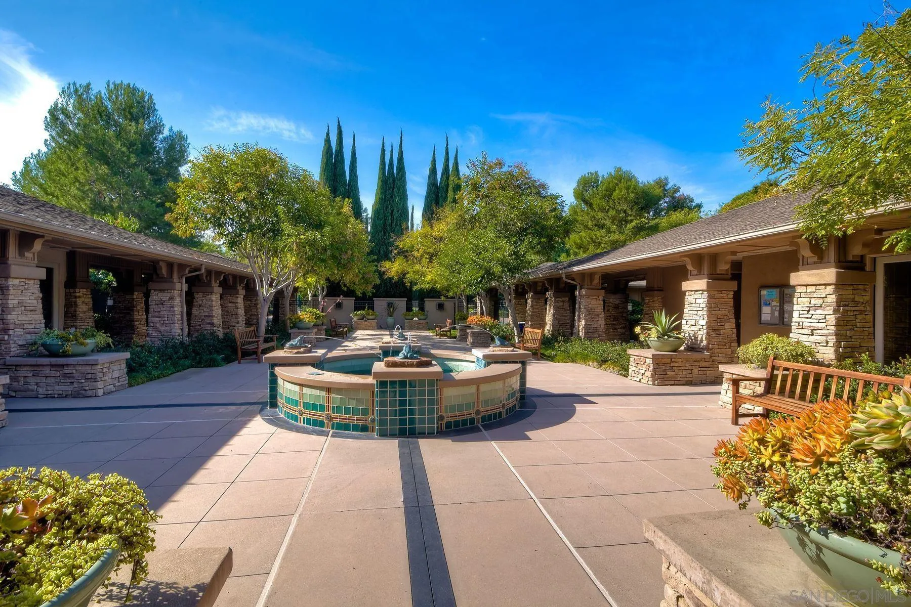 9633 Stonecrest Boulevard San Diego, CA 92123 - Photo 37 of 45 a view of a house with sitting area and garden