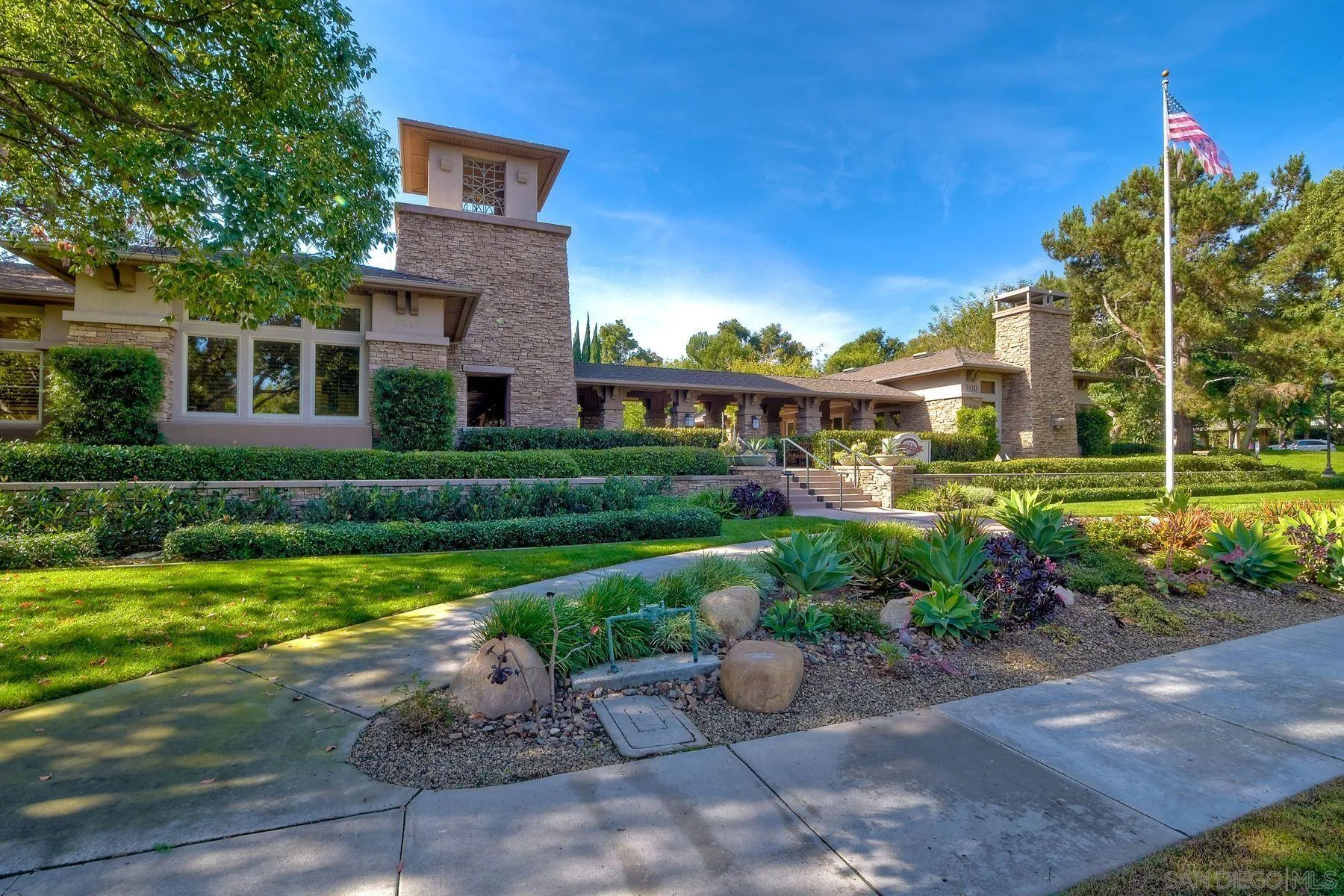 9633 Stonecrest Boulevard San Diego, CA 92123 - Photo 43 of 45 a view of a house with a yard