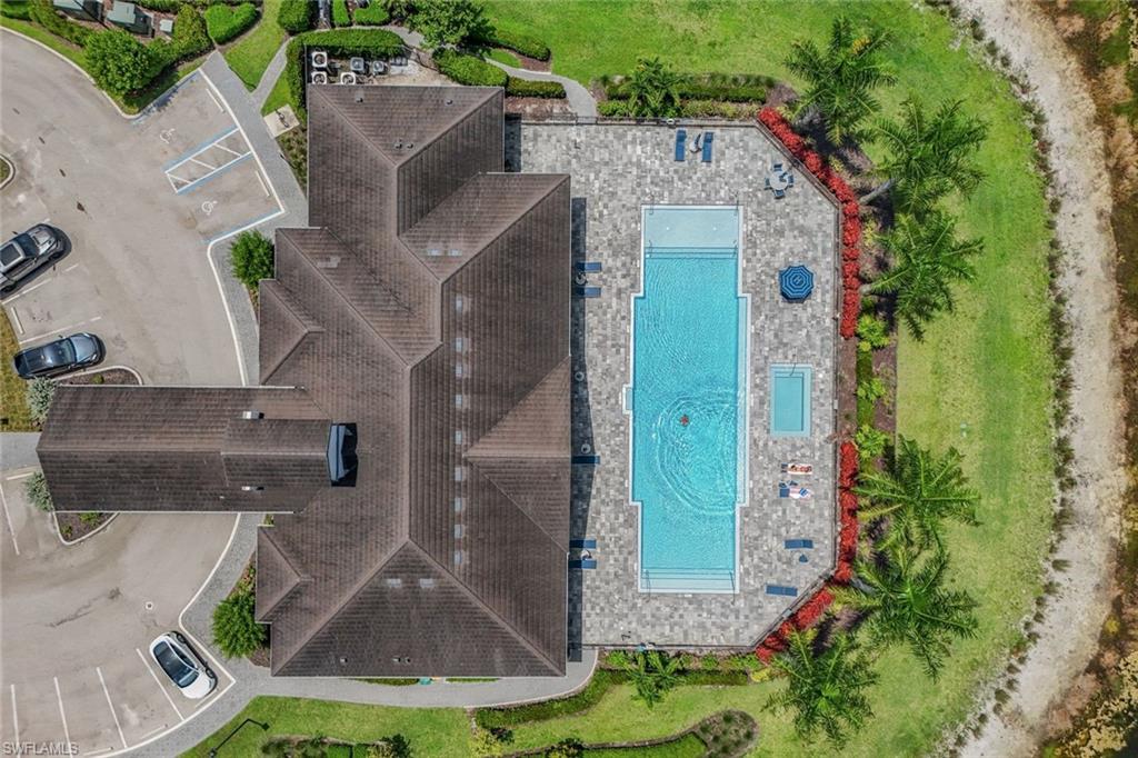 7348 Rockefeller Drive Naples, FL 34119 - Photo 37 of 39 Aerial View of Clubhouse & Community Pool