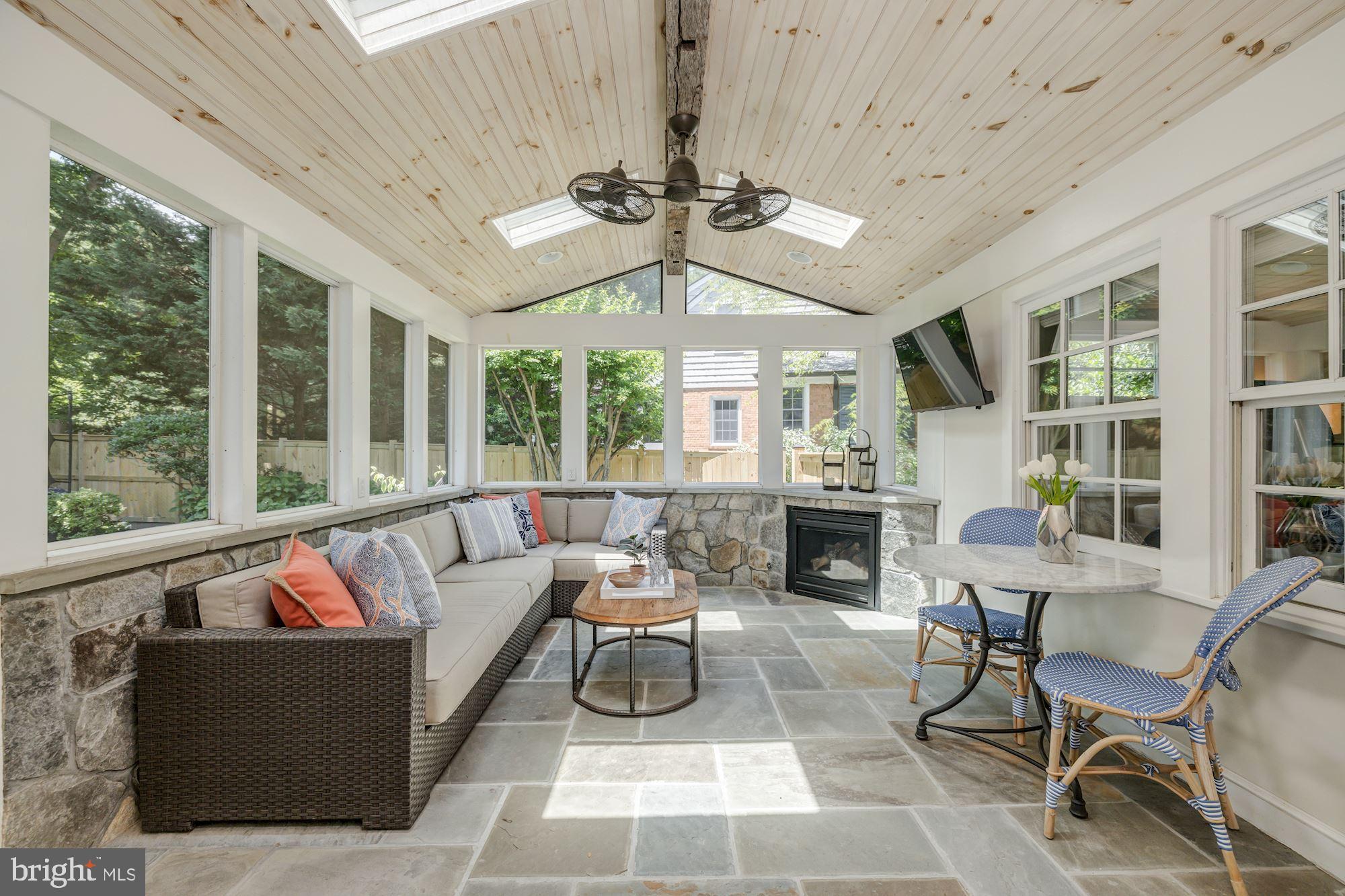 4912 Baltan Road Bethesda, MD 20816 - Photo 16 of 36 Screened porch w/gas fireplace