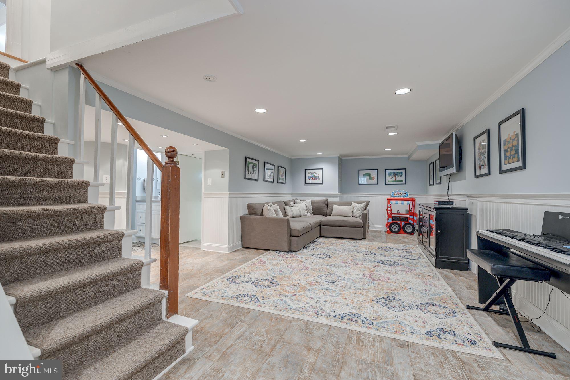 4912 Baltan Road Bethesda, MD 20816 - Photo 26 of 36 Lower level family/entertainment room