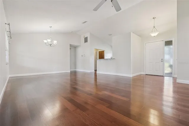 a view of a livingroom with wooden floor