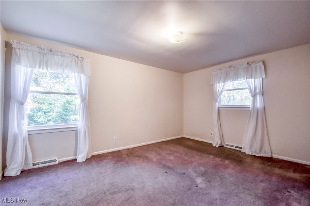 6145 Hemingway Road Cleveland, OH 44143 - Photo 33 of 50 Carpeted empty room featuring baseboards