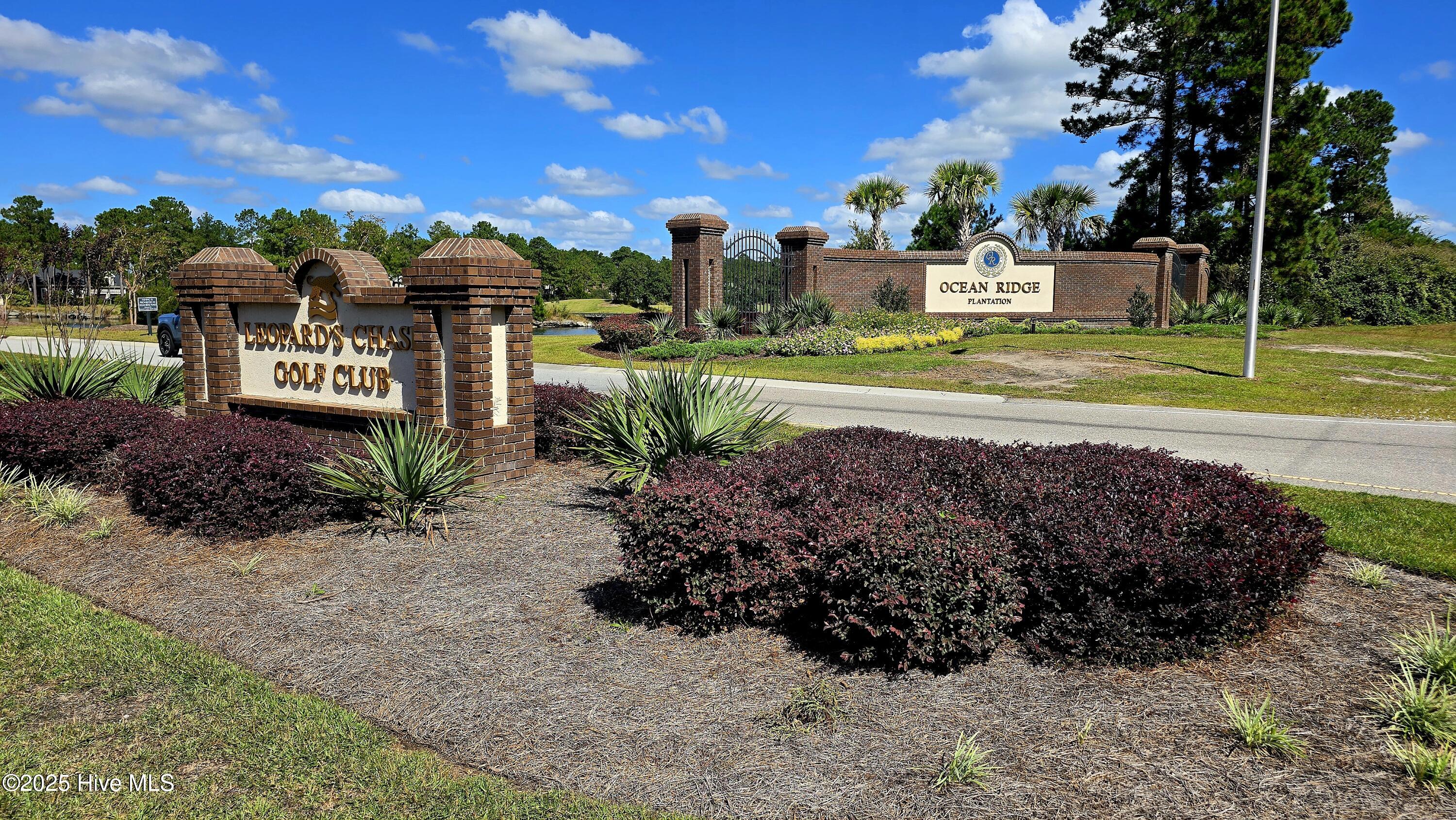 503 Cromwell Notch Southwest Ocean Isle Beach, NC 28469 - Photo 14 of 16 Golf course and Ocean Ridge Plantation entrance signs.
