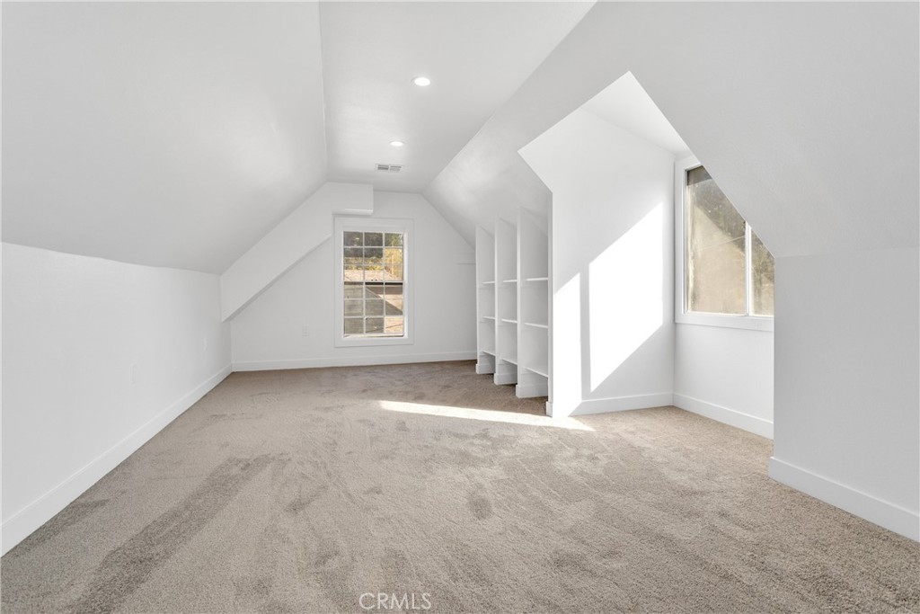 3635 Locust Street Riverside, CA 92501 - Photo 20 of 25 an empty room with windows and closet