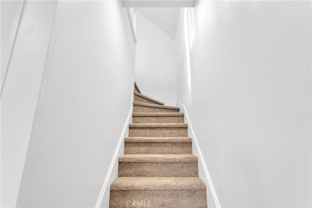 3635 Locust Street Riverside, CA 92501 - Photo 10 of 25 a view of staircase with white walls