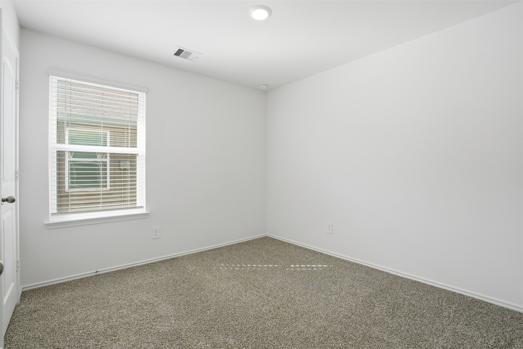 12214 Ridge River Lane Houston, TX 77067 - Photo 16 of 21 an empty room with a window