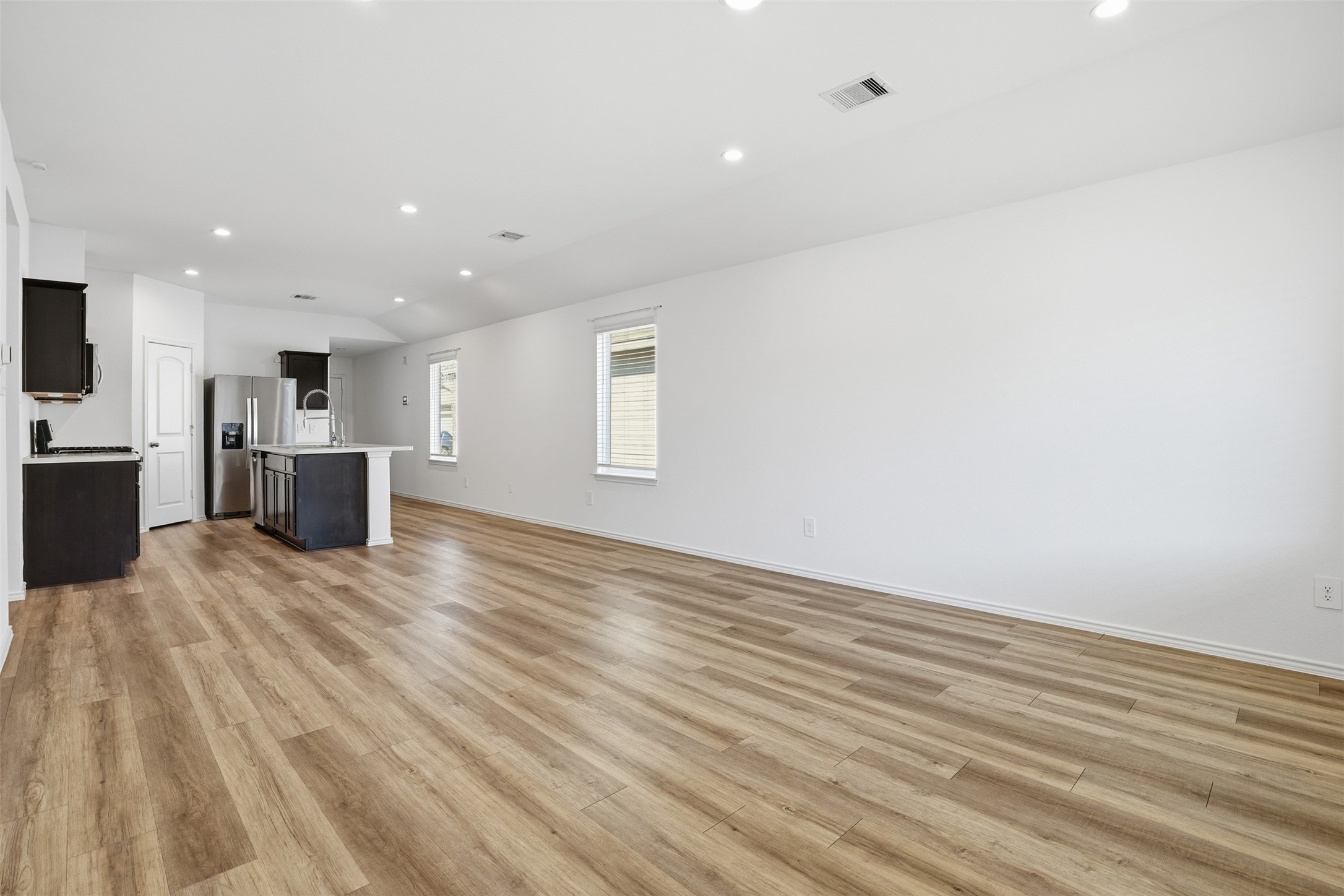 12214 Ridge River Lane Houston, TX 77067 - Photo 9 of 21 a view of an empty room with a window