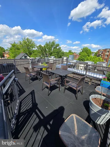a view of a terrace with furniture