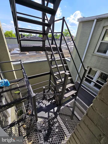 a view of a chairs and table in the terrace