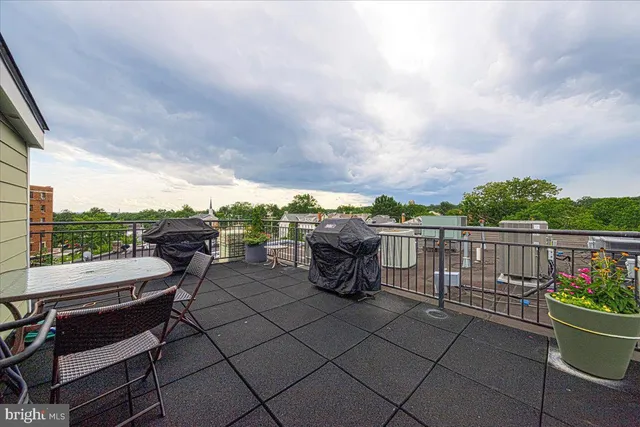 a view of a terrace with furniture