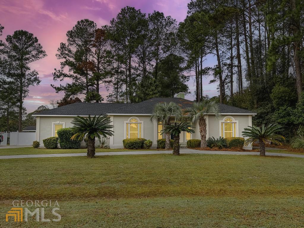 921 Barkley Street Waycross, GA 31501 - Photo 1 of 1 a front view of a house with a yard