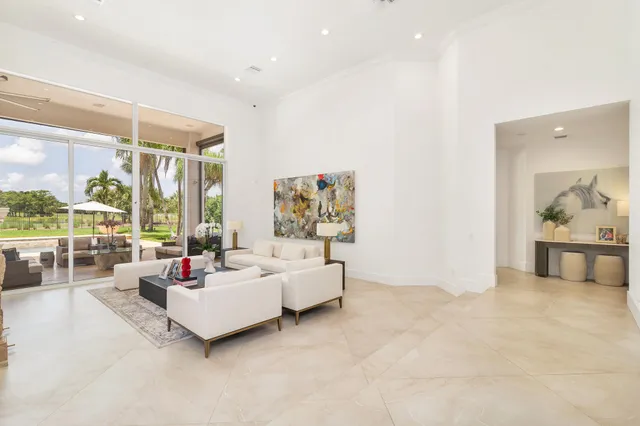 a kitchen with stainless steel appliances kitchen island granite countertop a sink and cabinets