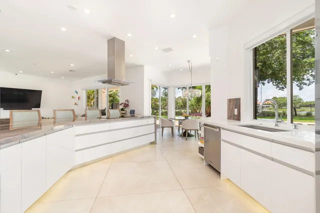 a living room with furniture chess board and a rug