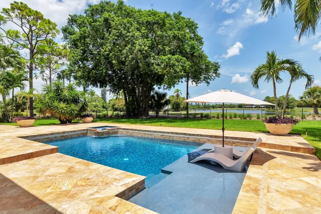 a view of a lake with a big yard