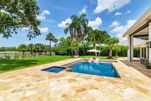 a view of a lake with a big yard