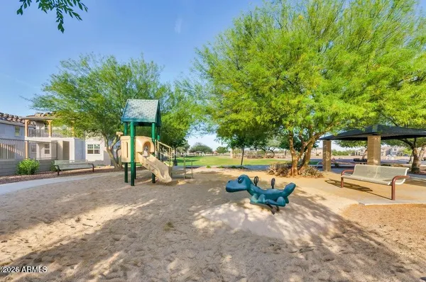 a view of a backyard with a patio