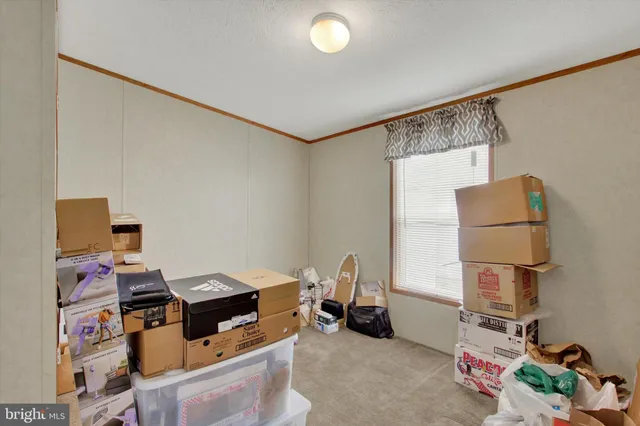 a room with furniture and a flat screen tv