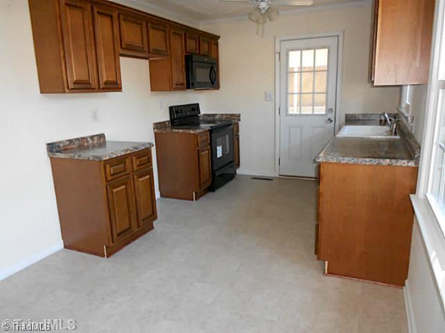 4561 Styers Ferry Road Winston-Salem, NC 27104 - Photo 4 of 14 Kitchen. All new cabinets and countertops!