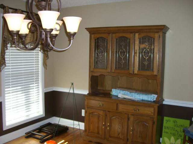 142 Whitaker Road Macon, GA 31211 - Photo 7 of 11 a view of a door and chair
