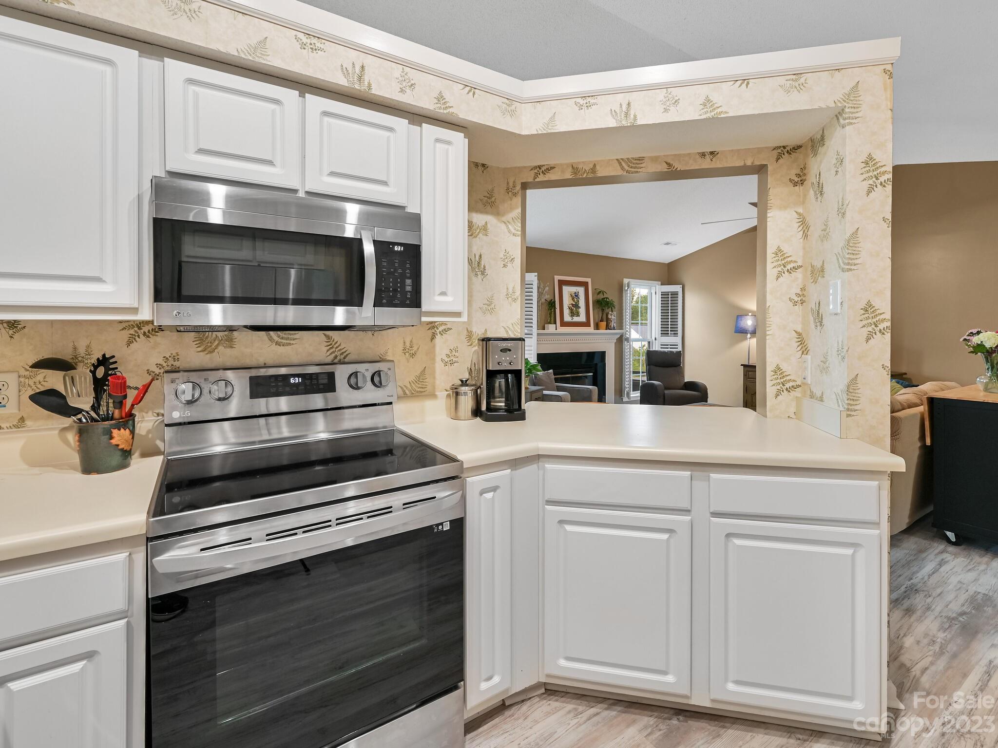 29 Stonehollow Road Fletcher, NC 28732 - Photo 13 of 21 a kitchen with cabinets and steel stainless steel appliances