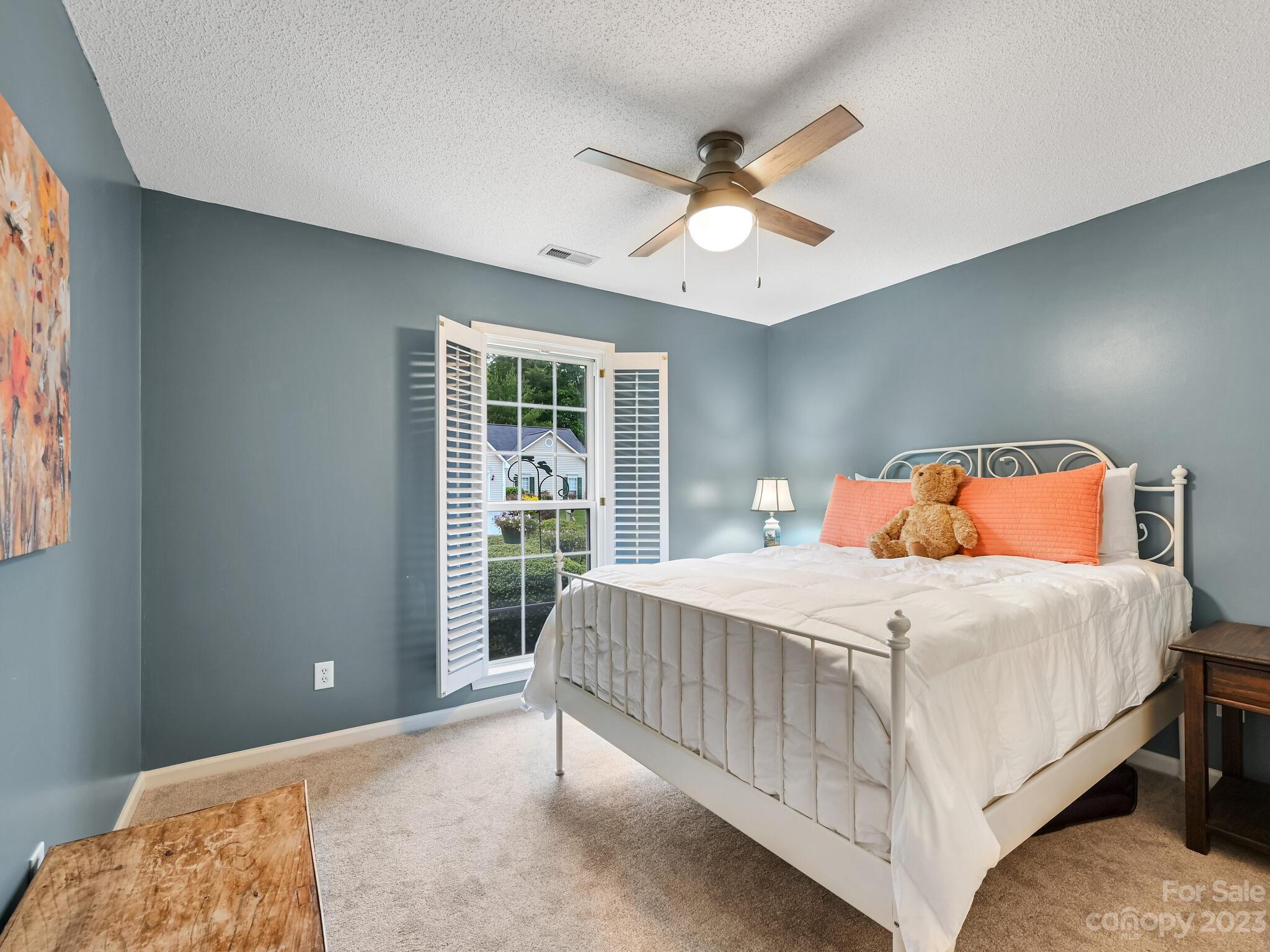 29 Stonehollow Road Fletcher, NC 28732 - Photo 18 of 21 a bedroom with a bed and window