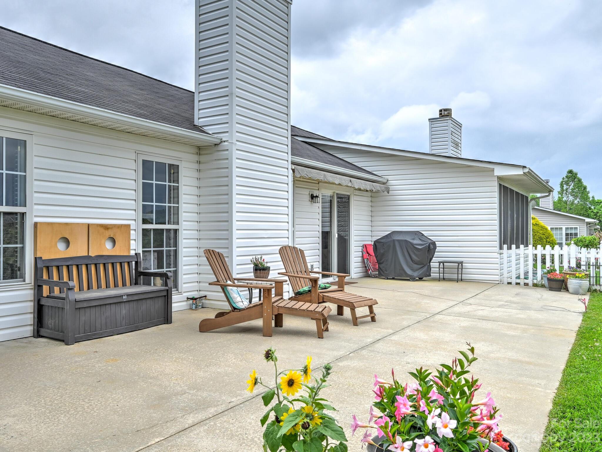 29 Stonehollow Road Fletcher, NC 28732 - Photo 10 of 21 a view of a dinning tables and chairs in patio of the house