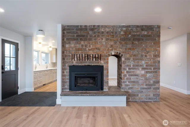 a living room with a fireplace