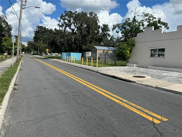 a view of a street with a houses