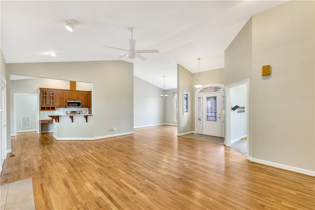 3620 Centerville Road Anderson, SC 29625 - Photo 24 of 49 Vaulted ceilings and warm hardwood floors create an inviting atmosphere in this open main level.