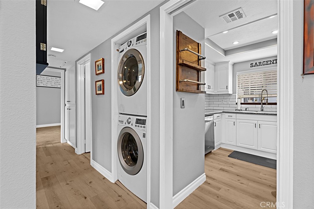24459 Howes Drive Laguna Niguel, CA 92677 - Photo 11 of 33 a view of a kitchen with washer and dryer