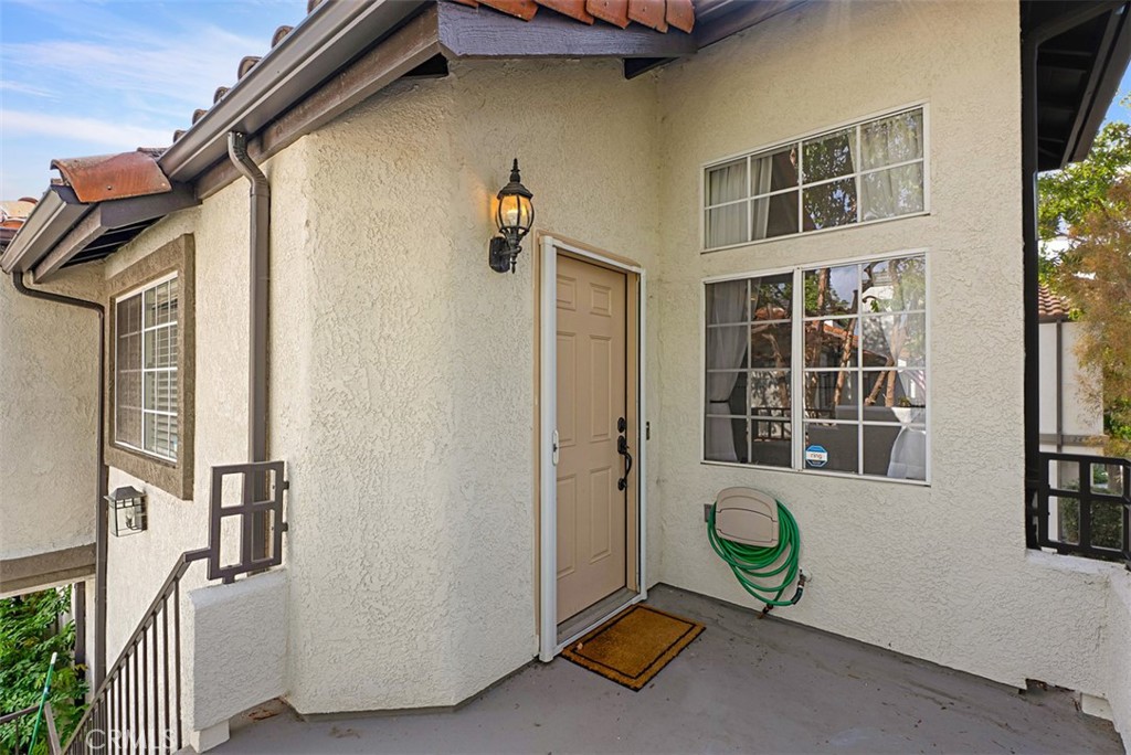 24459 Howes Drive Laguna Niguel, CA 92677 - Photo 20 of 33 a view of a house with a backyard