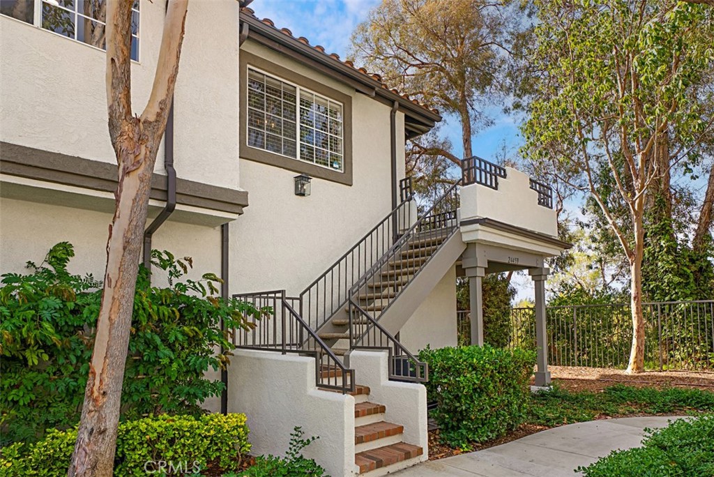 24459 Howes Drive Laguna Niguel, CA 92677 - Photo 21 of 33 front view of a house with a street