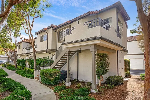 a tennis court with trees in the background