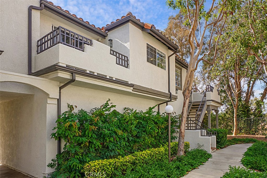 24459 Howes Drive Laguna Niguel, CA 92677 - Photo 23 of 33 a view of a street sign under a large tree