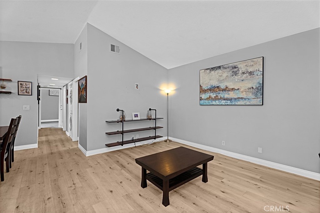 24459 Howes Drive Laguna Niguel, CA 92677 - Photo 7 of 33 a living room with furniture and a wooden floor