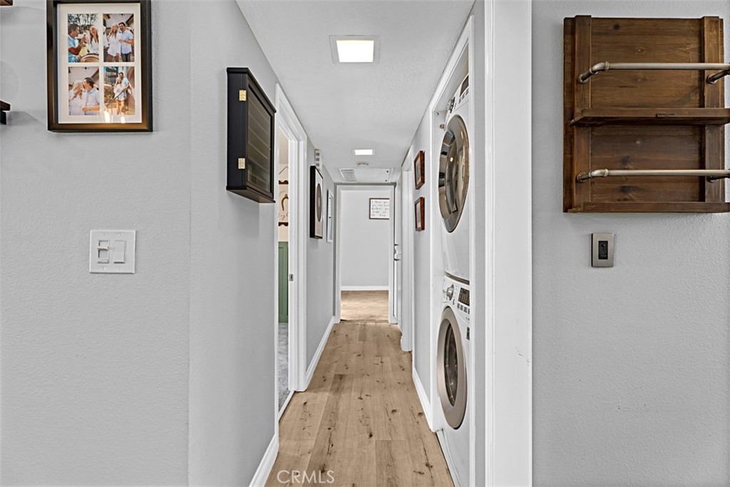 24459 Howes Drive Laguna Niguel, CA 92677 - Photo 10 of 33 a view of a hallway with washer and dryer
