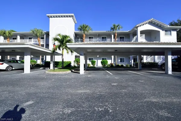 a front view of a building with street view