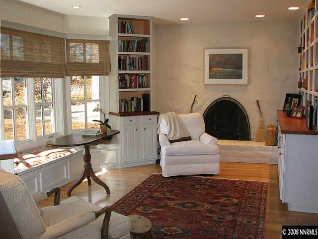 2170 Lander Street Reno, NV 89509 - Photo 7 of 9 a living room with furniture and a fireplace
